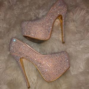 Alba Nude rhinestone platform stilettos.